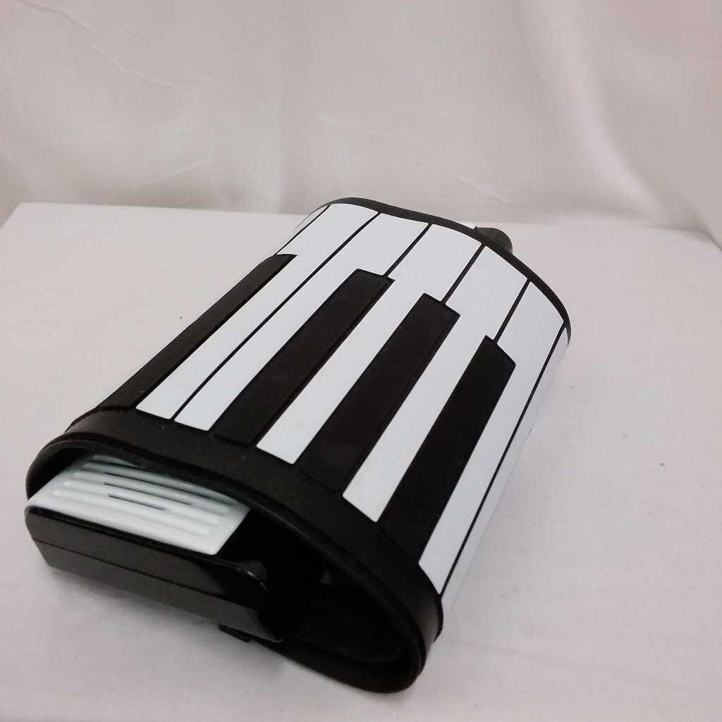 SHARPER IMAGE ROLL N PLAY PIANO WITH BAG AND CHARGER (DONATED DOESNT FULLY WORK)